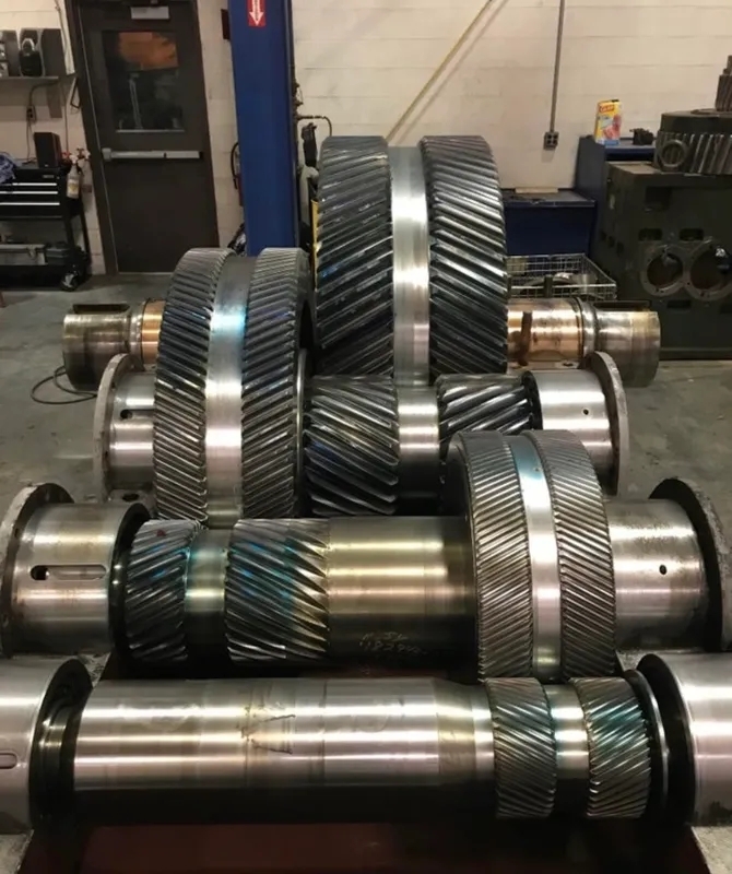 What are the potential drawbacks of using induction hardening as the primary method for surface hardening gearbox gear teeth?