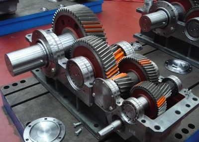 Can accelerated life testing accurately predict the lifespan of a gearbox under normal operating conditions?