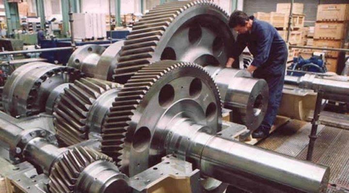 What role does the mechanical strength of a material play in gearbox housing selection?